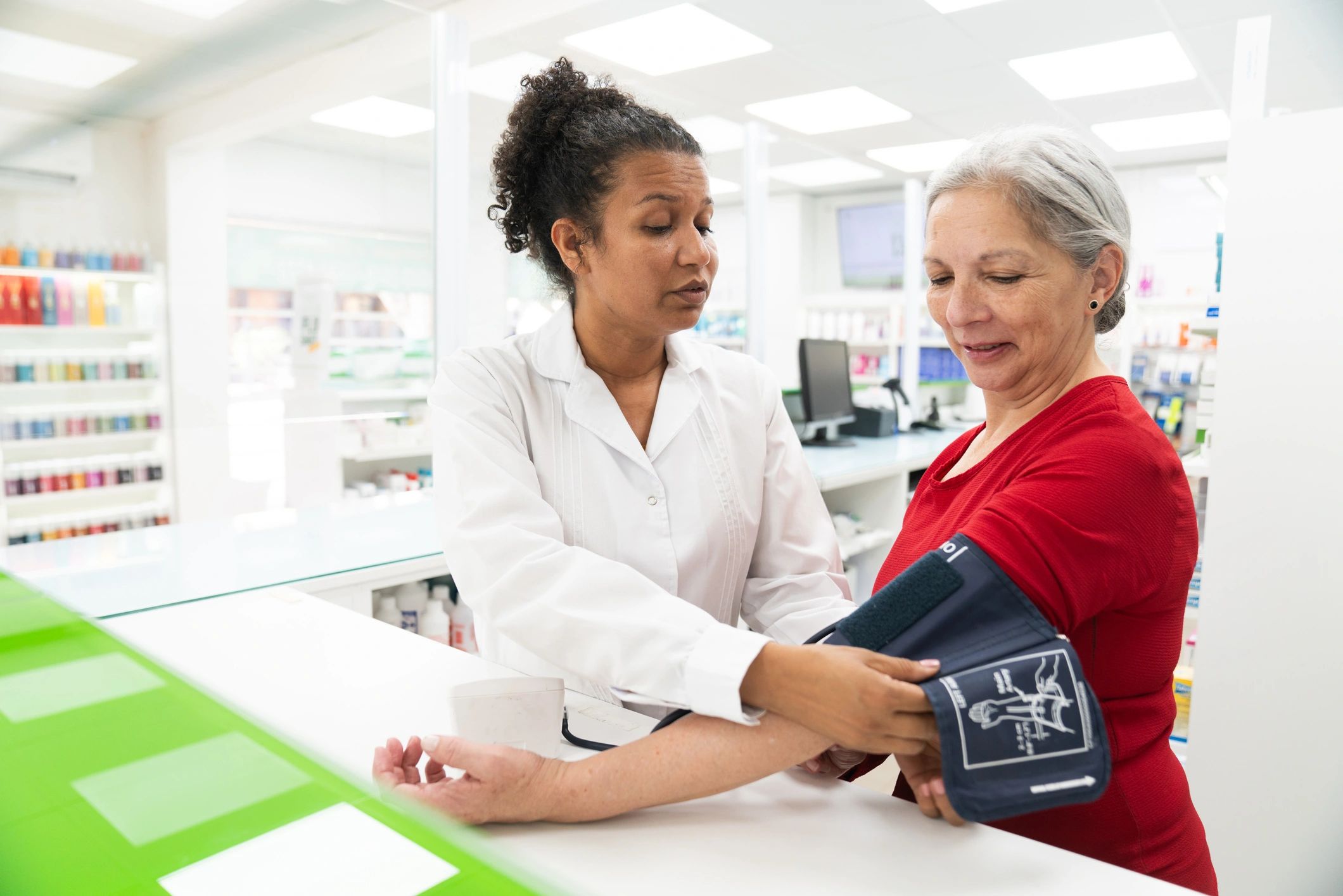 Senior woman receiving a health check